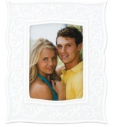Featuring the embossed vine motif and shiny white glaze of the Opal Innocence Carved collection, this Lenox picture frame is designed to refine your home indefinitely. A lovely gift for the bride and groom! Qualifies for Rebate