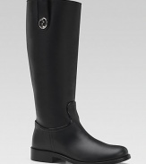 Tall leather riding boots with side zipper, leather tabs and metal, double G detailing.Side zipper and leather pull-on tabLeather upperFabric and leather liningLeather sole with anti-slip rubberPadded insoleMade in Italy
