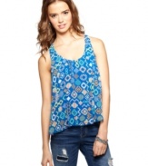 Add tribal kick to your daytime gear with this colorful top from Living Doll! Flaunts a cool, ruffled opening at the back!