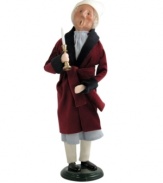 Even Scrooge finds a song in his heart this holiday! Stirred from his bed by the ghosts of Christmas past, this handcrafted Byers' Choice figurine wears the robe, pajamas and sleeping cap of Dickens' most infamous character.