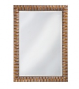 Rugged yet refined, Howard Elliot's Moore mirror frames contemporary decor in simply carved, antique-finished wood. A mottled copper hue adds subtle radiance for a look that's undeniably handsome.