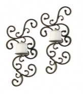 Welcome in brilliance. Striking vine-inspired sconces deck the walls of your home, splashing candlelight on the walls and defining the space with a romantic metal design.