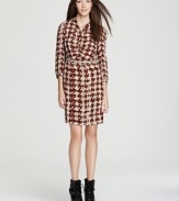 Uptown polish meets downtown edge as classic houndstooth check emboldens a contemporary Burberry Brit dress. Juxtapose the silky silhouette with chunky booties for the perfect high/low mix.