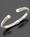 A beautiful bangle with sophisticated accents that works with your daily look or evening wear. Featuring cultured freshwater pearls (7 mm) and round-cut diamond accents, this braided bangle is crafted in 14k gold and sterling silver. Approximate diameter: 2-1/2 inches.