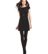 Studio M's ponte-knit dress features simple, sleek styling and a shiny buckle detail at the waist.