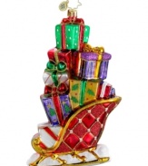 A vintage sleigh stacked high with presents make the Gifts on the Go ornament a festive sight from season to season. Featuring the mouth-blown, hand-painted glass of Christopher Radko.