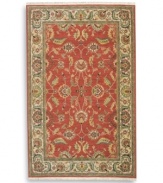 Inspired by the lush tapestries of the 17th-century Mogul dynasty, this classic Agra rug features a scrolling vine design of oversized palmettes and serrated leaves. The green and ivory tones in the palmette border perfectly complement the dynamic color shadings of the rich red ground. Special color treatment creates a gentle finish. Woven of premium worsted New Zealand wool for indulgent softness.