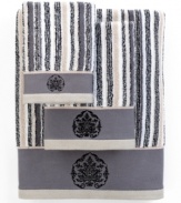 Sweet serenity. Offering a romantic and elegant composition for your bath space, this Aquarelle Embroidery washcloth features beautiful stripes in sophisticated hues. Embellished with subtle embroidery along the hem.