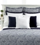 The rich look of paisley brings tailored texture to your bedroom in this Navy Paisley Suite comforter from Lauren Ralph Lauren. Trimmed with luxurious self cording over 383-thread count woven jacquard, this pattern combines traditional beauty with studied, modern appeal.