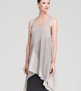 Breezy layers and an angled hem infuse this Eileen Fisher tunic with ethereal elegance. Showcase the billowing silhouette atop sleek leggings.