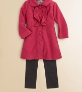 Tailored seams and ruffled bib detail make this classic peacoat design perfect for dressy occasions.Rounded collarFront button closureTailored seamsPolyester/viscoseFully linedMachine washImported