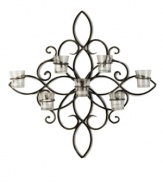 Tie your space together with the bold lines of this artsy metal sconce. Bare walls come to life under the flickering light and strong flower-influenced design.