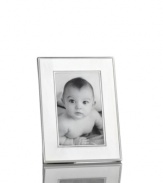 Delicately beaded edges add to the resplendent beauty of this Silver Bead picture frame from Martha Stewart Collection. Simply timeless in brilliant silver plate, it brings new attention to the past. With velvet backing.
