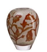 Striking when filled with your favorite colorful blooms or a stunning accent on its own. This hand-made glass vase designed by Olle Brozen for Kosta Boda lends sophistication to your tabletop or mantlepiece. Measures 5-7/8 H.