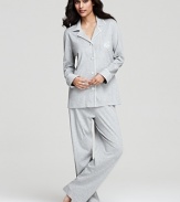 A classic pajama set that you'll be tempted to show off outside the bedroom, featuring ornate logo and contrast trim.