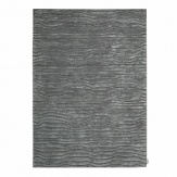 This luxurious hand-crafted Calvin Klein rug is composed of a soft luminescent pile with suede accents, creating innovative texture for the home.