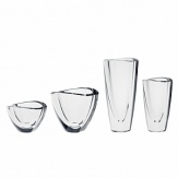 Mirror is a modern collection designed for Orrefors by Erika Lagerbielke. These vases and bowls feature exquisite cut detail for which the designer is known. Shown left to right: 5 bowl, 6 bowl; 6 vase; and 9 vase.