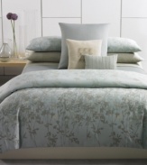 Starburst embroidery at center gives this Calvin Klein decorative pillow a chic, modern appeal.