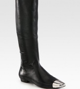 Tall silhouette of butter-soft leather, finished with a square metal cap toe for modern appeal. Shaft, 15¾Leg circumference, 14Leather upper with metal cap toePull-on styleLeather lining and solePadded insoleImportedOUR FIT MODEL RECOMMENDS ordering one half size up as this style runs small. 