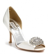 Elegant satin meets opulent crystal for a shoe that's sure to turn heads.