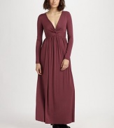 Invitingly low v-neck with allover shirring and a hint of stretch. Deep v-neck Long sleeves Banded waistband About 20 from natural waist 92% modal/8% spandex Dry clean Made in USA