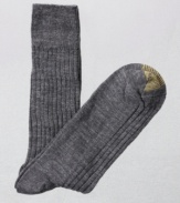 Dress the part from the bottom up with these comfortable and refined wool socks. Ribbed for comfort and fit, they have a handsome, tonal heathered color. Sold in three packs of one color.
