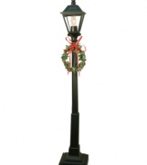 Light the way through your Christmas village and for all the Byers' Choice carolers with a beautifully bedecked lamppost.