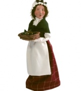 Mrs. Cratchit does the best she can with Christmas dinner, delivering her famous plum pudding to your home. Her charming Byers' Choice figurine, handcrafted and painted with exquisite detail, evokes her family's feast.