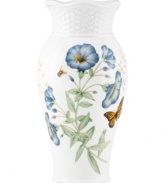 Crafted of elegant white porcelain, this Lenox vase combines the beloved Butterfly Meadow motif with a scalloped edge and textured accents for a look of country charm. Qualifies for Rebate
