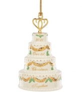 How sweet. Cherish your first Christmas together with this special Lenox cake ornament. Four tiers of ivory porcelain decorated with brilliant gold and festive holly make it a gift any happy couple will cherish. Qualifies for Rebate