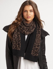 A luxuriously soft style with a solid contrast border. Cashmere About 68 X 25 Dry clean or hand wash Imported 