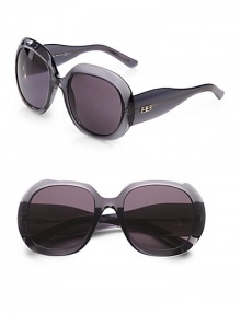 These mid-sized, acetate frames are the perfect accessory to any outfit. Available in smoke with dark grey lens. Logo temples100% UV protectionMade in Italy These mid-sized, acetate frames are the perfect accessory to any outfit. Available in smoke with dark grey lens. Logo temples100% UV protectionMade in Italy