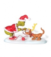 Loyal and true, Max resigns himself to the evildoings of his once-heartless master, the Grinch, in this porcelain figurine from Department 56.