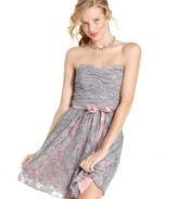 This girly strapless dress from Trixxi features a sugary-sweet lace print and a ribbon-sash for an extra dash of cute!