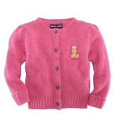 A preppy, patched cardigan is knit in a luxuriously soft wool and angora blend.