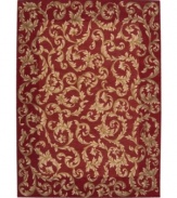A long runner that is ideal for hallways and entryways. Evoking the opulence of European decor, this rug features an elegant floral scroll pattern in gold against a rich russet ground, subtly framed in burgundy. The premium wool weave imparts rich texture and indulgent softness.