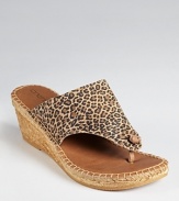 Take a walk on the wild side with Andre Assous' leopard printed Alyssa wedge--this thong toe, espadrille silhouette is easy to slip on and go.