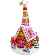 Treat yourself or someone on your list to the Sweet Celebration ornament. Beautifully hand painted with peppermint swirls and other colorful candies, this Christopher Radko design evokes the classic gingerbread house in pure glass.