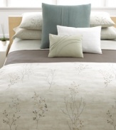 A delicate branch design on an exquisite watercolor ground lends an air of natural beauty to this Briar comforter from Calvin Klein.