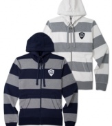 American Rag riffs on the classic collegiate warm-up with a rugby-striped zip-up hoodie complete with a college-style crest on the chest.