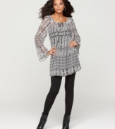 Sheer sleeves and an intricate print make One World's flowing dress a unique piece for any closet. Perfect with knee-high boots and leggings!
