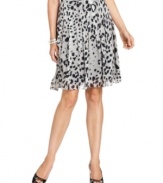 Pretty pleats and a graphic animal print combine to create a modern take on a traditional silhouette, from Jones New York.