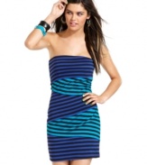 Panels of alternating color drape asymmetrically across a hot-weather dress that pops! From Material Girl.