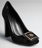 A squared logo plate lends a 60s feel to Tory Burch's retro-inspired Julian pumps, dressed up with patent piping.