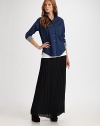Timeless pleats in a floor-length silhouette with a semi-sheer hem and convenient zipper closure. Back zipperButton closureSemi-sheer hemAbout 45 from natural waistPolyesterDry cleanMade in USA of Italian fabricModel shown is 5'9½ (176cm) wearing US size 4.