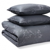 With a delicate pattern of leaves and small berries on a navy ground, this Calvin Klein comforter set exudes peaceful elegance. The comforter and sham pair perfectly with hyacinth hue sheets and accent pillows for sweet dreams.