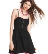 Material Girl pumps edge into the little black dress via hot pink trims and a bustier-style top! Style the frock with color fun accessories that electrify your day look!
