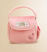 This ultra-soft purse with matching strap makes the sweetest fashion statement for your little girl. Set includes a ringing cell phone, a compact with plastic mirror and a change purse.Shoulder strapOutside cellphone pocketInside pocket8H X 6L X 2DPolyesterSurface washRecommended for ages 0 and upImported