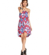 An abstract tribal-print adds serious color magic to this wrap-style halter dress from Eyeshadow!