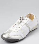 Patent or metallic trim adds a glam touch to these DKNY sneakers, a chic upgrade to the average gym shoe.